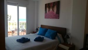 Posteľ alebo postele v izbe v ubytovaní Preciosas vistas al mar