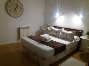 A bed or beds in a room at Casa de Huéspedes Prada
