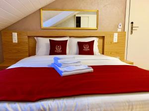 Postel nebo postele na pokoji v ubytování Hotel Adore