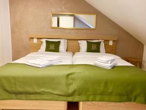 Postel nebo postele na pokoji v ubytování Hotel Adore