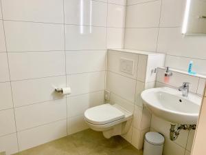 Koupelna v ubytování Hotel Adore