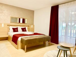 Postel nebo postele na pokoji v ubytování Hotel Adore