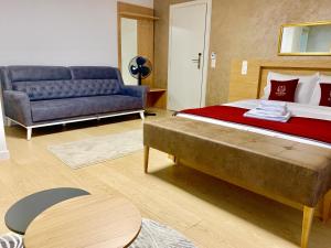Postel nebo postele na pokoji v ubytování Hotel Adore