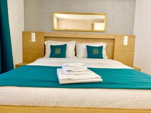 Postel nebo postele na pokoji v ubytování Hotel Adore