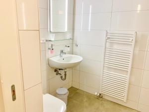 Koupelna v ubytování Hotel Adore