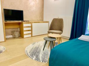 Postel nebo postele na pokoji v ubytování Hotel Adore