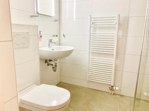 Koupelna v ubytování Hotel Adore