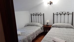 A bed or beds in a room at cortijo la laguna Még 37 kép