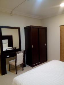 Cama ou camas em um quarto em Al Massah Al Khalijiyah Furnished Units