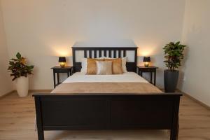 A bed or beds in a room at Le Monde Apartment Bratislava - amazing 5BDR in downtown