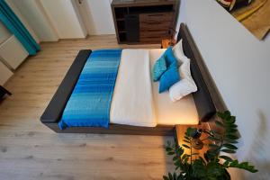 A bed or beds in a room at Le Monde Apartment Bratislava - amazing 5BDR in downtown