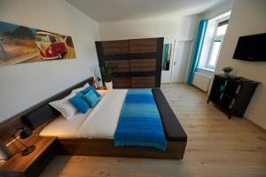 A bed or beds in a room at Le Monde Apartment Bratislava - amazing 5BDR in downtown
