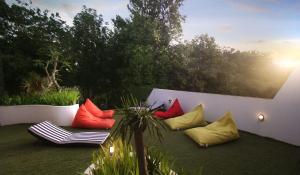 Onesouth Boutique Hotel Pulau merah外面的花园