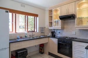 A cozinha ou cozinha compacta de Castleton Plettenberg Bay