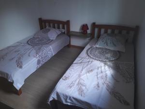 Ένα ή περισσότερα κρεβάτια σε δωμάτιο στο Le 109