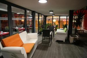 Posezení v ubytování Hotel Bagoeira