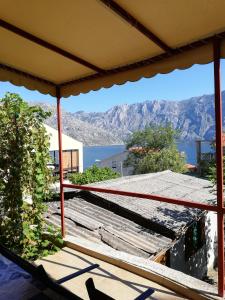 a view from the balcony of a house at Ruža Apartments in Kotor