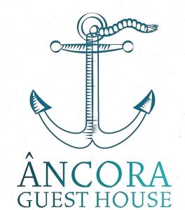 an anchor with the words an american guest house at Âncora Guest House in Monte Gordo
