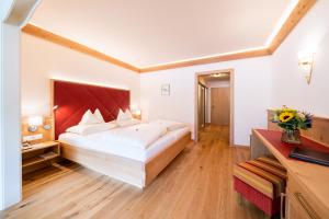 Postel nebo postele na pokoji v ubytování Thermenwelt Hotel Pulverer