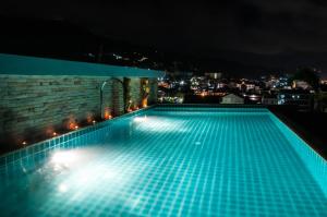 Bazén v ubytování Patong Mansion - SHA Certified nebo v jeho okolí