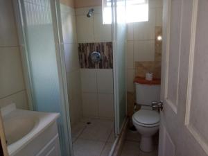 Kylpyhuone majoituspaikassa Nicolodge Apartments