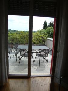 Balkón nebo terasa v ubytování Relais Villa Lézard