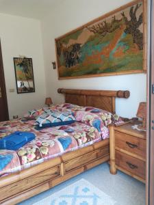 Postel nebo postele na pokoji v ubytování B&B Zia Delia