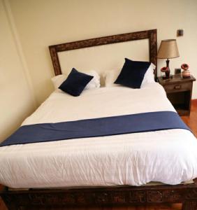 Cama o camas de una habitación en FikirandRay Lodge