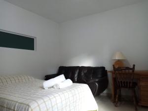 Postel nebo postele na pokoji v ubytování Milenio III B&B