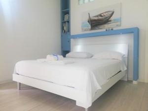 Postel nebo postele na pokoji v ubytování AlbaChiara B&B