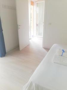 Postel nebo postele na pokoji v ubytování AlbaChiara B&B