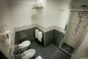 Koupelna v ubytování Soave Rooms
