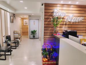 a lobby of a salon with a waiting room at Tim Place - BTS Phra Khanong in Bangkok