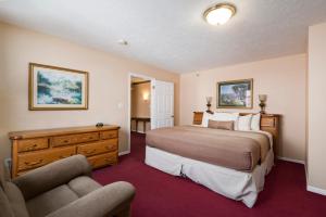 Tempat tidur dalam kamar di The Kimball at Temple Square