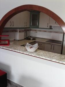 Una cocina o zona de cocina en Bahia De Almeria