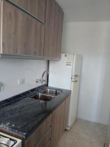 Nhà bếp/bếp nhỏ tại Departamento Ripozi Centro muy luminoso