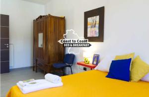 Postel nebo postele na pokoji v ubytování B&B Coast to Coast