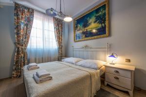 Posteľ alebo postele v izbe v ubytovaní Boutique Hotel Carpe Diem