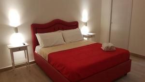Postel nebo postele na pokoji v ubytování B&B Pompeii Rooms