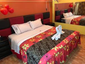 Postel nebo postele na pokoji v ubytování Hotel Manantial No,001