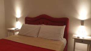 Postel nebo postele na pokoji v ubytování B&B Pompeii Rooms