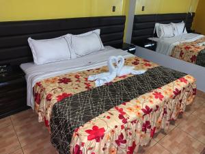 Postel nebo postele na pokoji v ubytování Hotel Manantial No,001