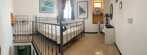 A bed or beds in a room at The Old Mansion