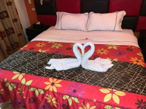 Postel nebo postele na pokoji v ubytování Hotel Manantial No,001