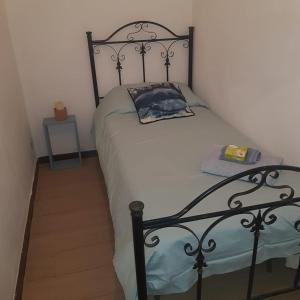 Cama o camas de una habitación en Incantevole villa con vista mozzafiato