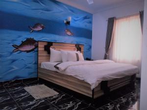 Krevet ili kreveti u jedinici u objektu Mountain Top Lodge Hotel