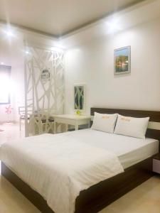 Cama ou camas em um quarto em Cosy Star Apartment and Motel