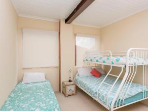 Ένα ή περισσότερα κρεβάτια σε δωμάτιο στο Werri Views