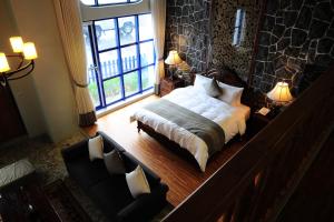 Postel nebo postele na pokoji v ubytování Chateau Villa