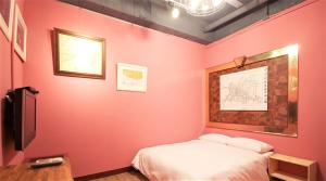 Postel nebo postele na pokoji v ubytování DongNing Atlas Hotel